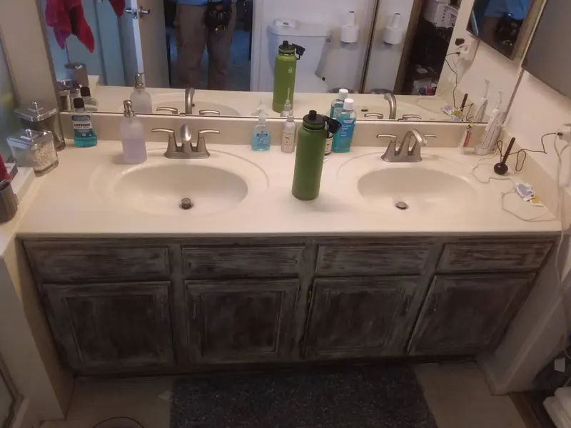 Water-damaged bathroom on 18th Street in Phoenix before cash purchase by Highest Cash Offer